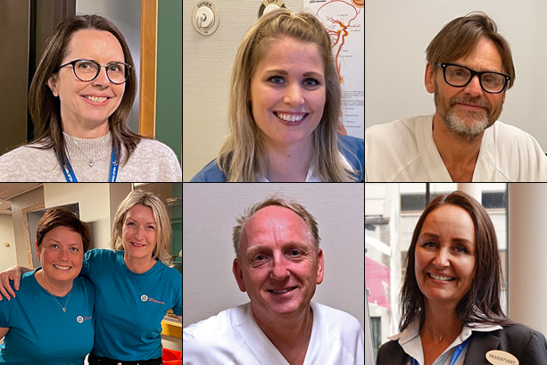 En gruppe mennesker som smiler